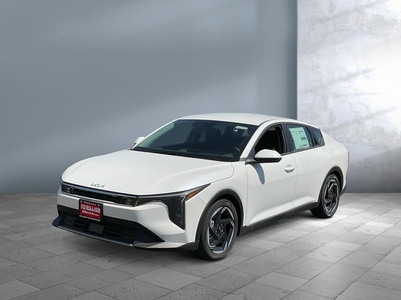 2026 Kia K4 EX in Snow White Pearl — front three-quarter view