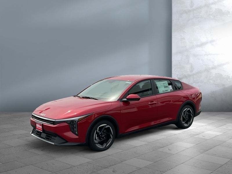 2026 Kia K4 EX in Red — front three-quarter view