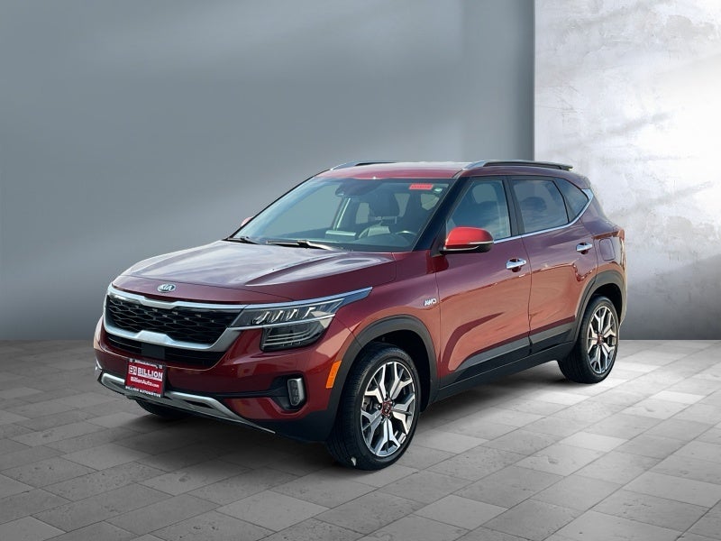 2021 Kia Seltos SX in Mars Orange — front three-quarter view