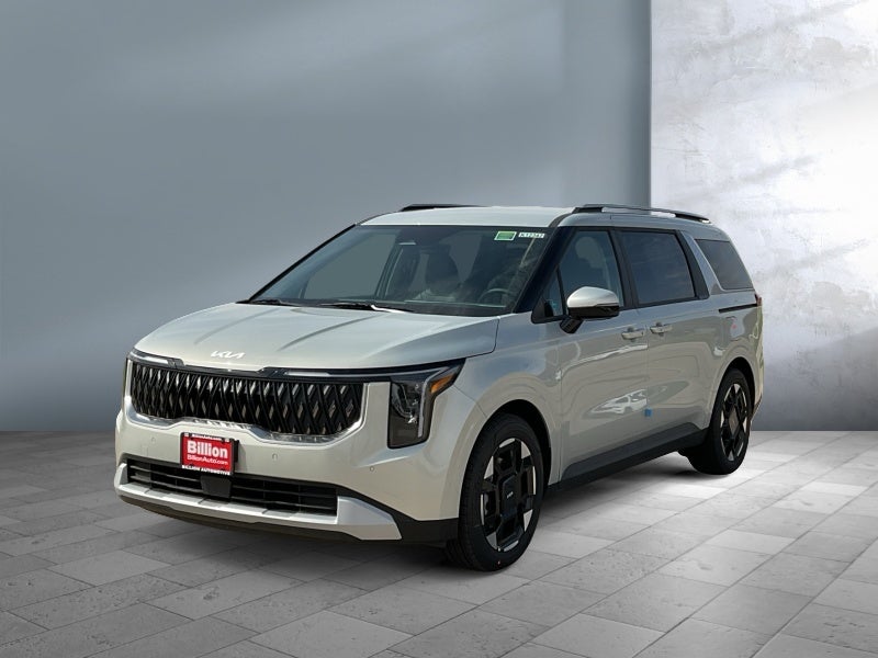 2026 Kia Carnival EX in Ivory Silver — front three-quarter view